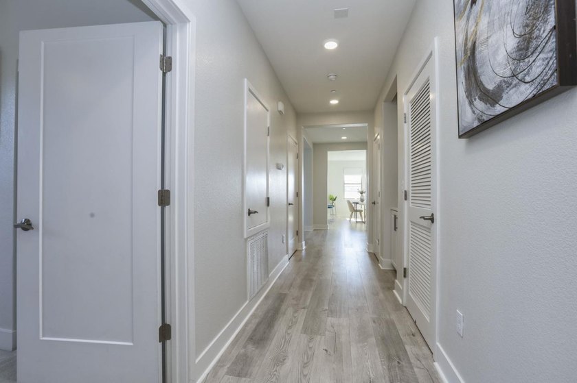 Welcome to 1089 Dewberry Place #401, a stunning top-floor corner - photo 31