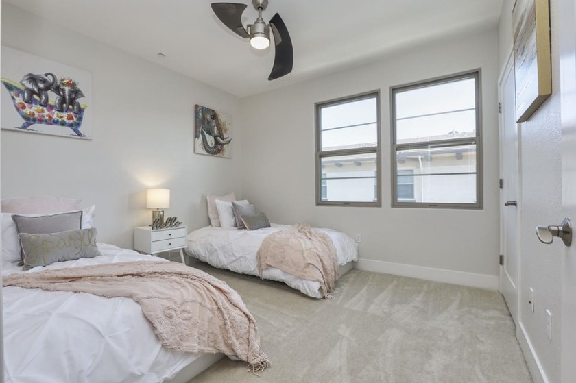 Welcome to 1089 Dewberry Place #401, a stunning top-floor corner - photo 32