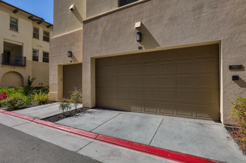 Welcome to 1089 Dewberry Place #401, a stunning top-floor corner - photo 39