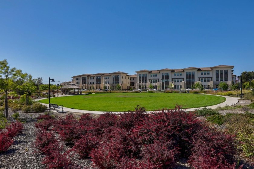 Welcome to 1089 Dewberry Place #401, a stunning top-floor corner - photo 44