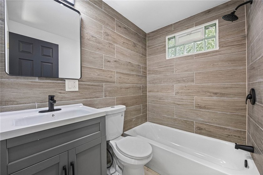 Completely renovated 3-bedroom, 2 full bath home offering - photo 10