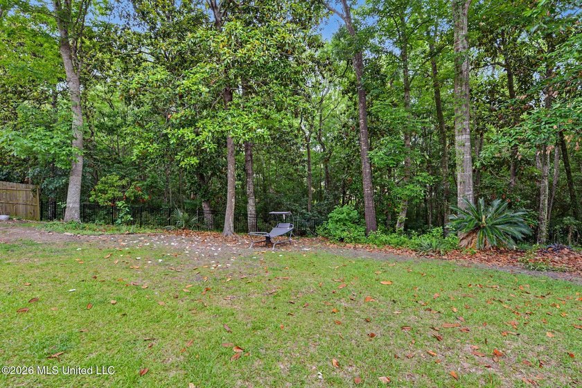 Tucked beneath mature trees in the highly sought-after Magnolia - photo 25