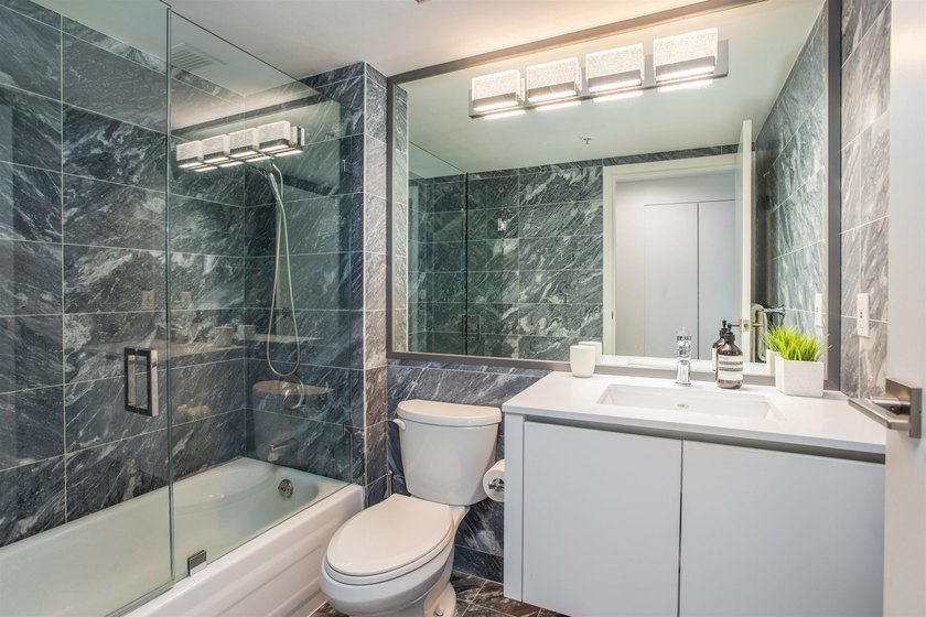 Governor's Tower in Yaletown, this updated 3-bedroom home offers - photo 13