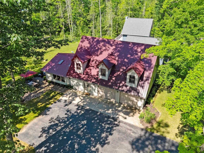 Experience the best of Northwoods living in a desirable home on - photo 13