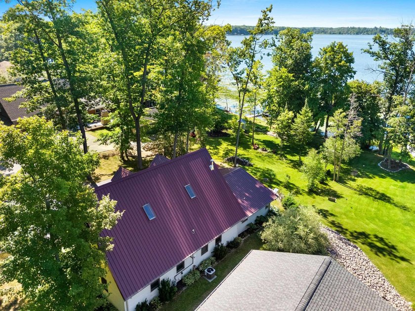 Experience the best of Northwoods living in a desirable home on - photo 18