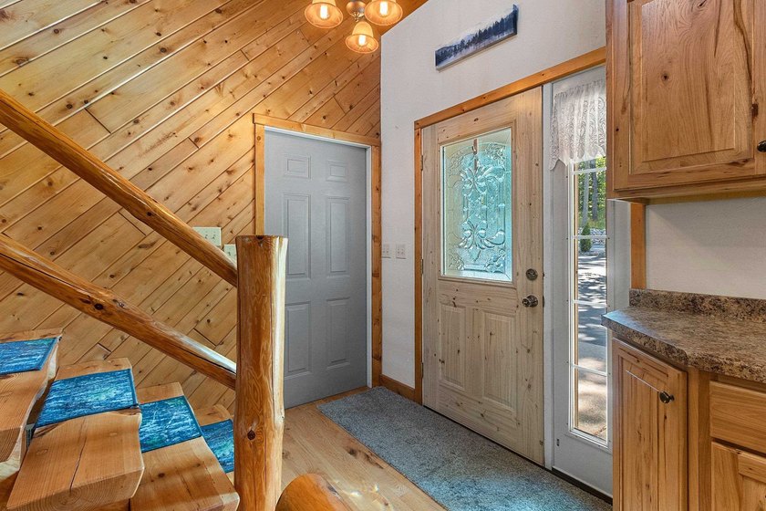 Experience the best of Northwoods living in a desirable home on - photo 24