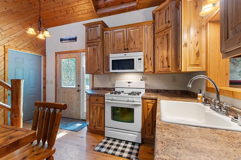 Experience the best of Northwoods living in a desirable home on - photo 30