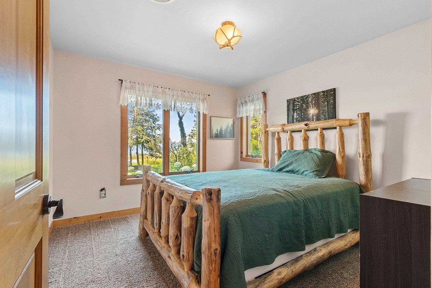 Experience the best of Northwoods living in a desirable home on - photo 49