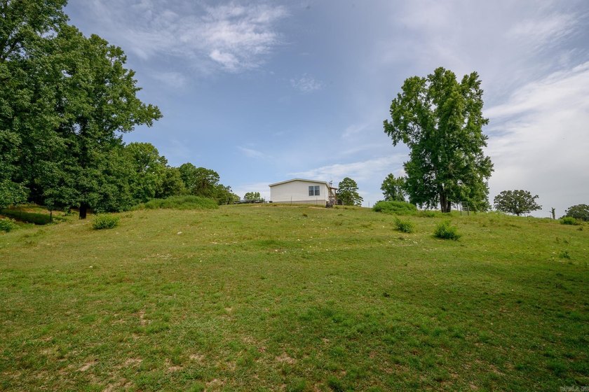 Nestled on just over 17 picturesque acres in Mount Ida, Arkansas - photo 32