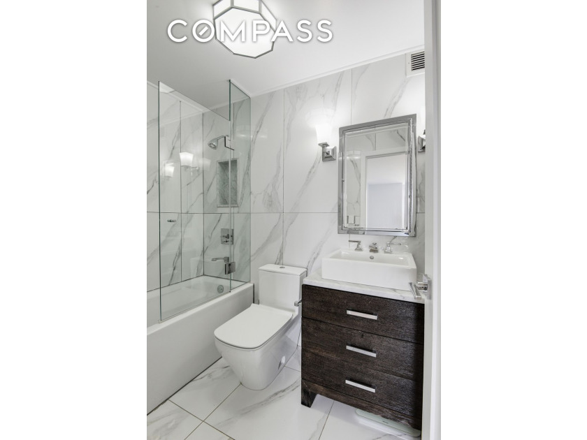 Exquisitely renovated and move-in ready, perched high on the - photo 11