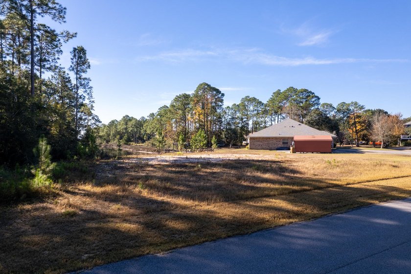 This wooded homesite provides a natural setting with mature - photo 9
