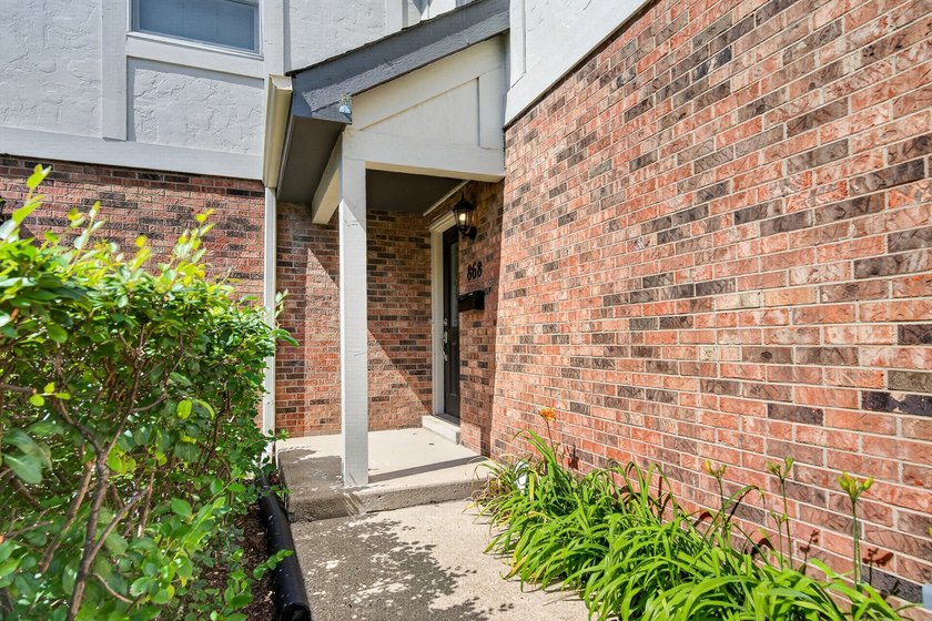 Welcome home to this picture-perfect second-floor townhome - photo 2