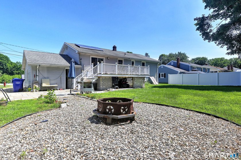 Welcome to this beautiful raised ranch located on a quiet street - photo 5