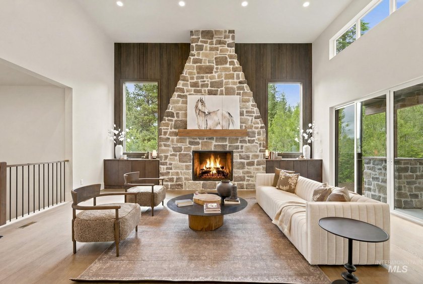 Nestled on a private, majestic wooded lot, this exquisite - photo 2