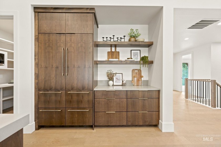Nestled on a private, majestic wooded lot, this exquisite - photo 5