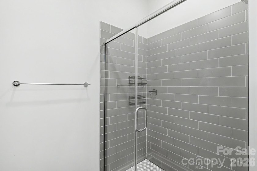 Perched on the top floor of one of NoDa's most coveted addresses - photo 7