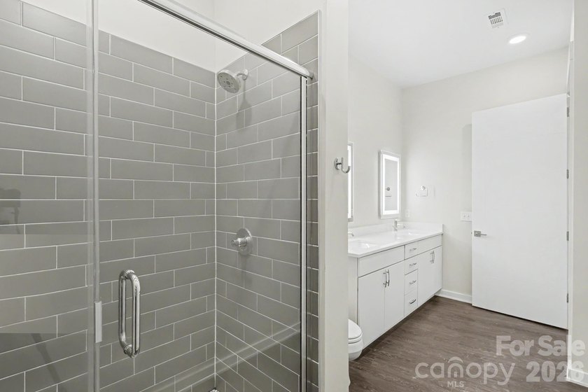 Perched on the top floor of one of NoDa's most coveted addresses - photo 8