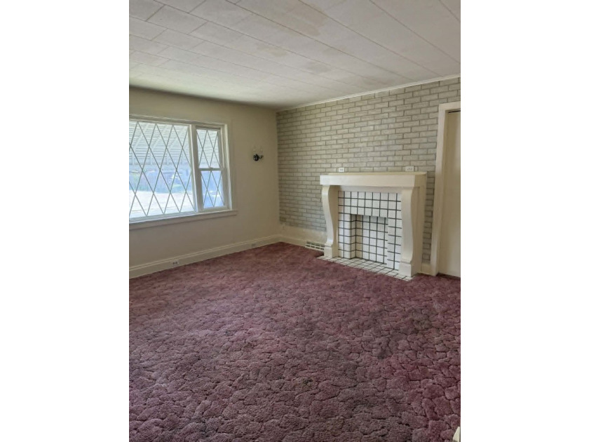 This City of Erie 2-unit has great curb appeal and will make a - photo 3