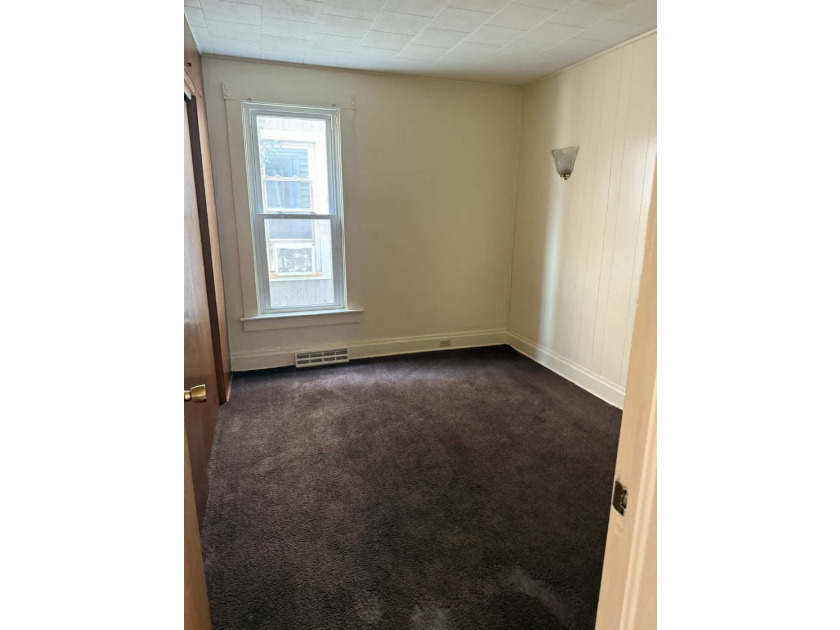 This City of Erie 2-unit has great curb appeal and will make a - photo 5
