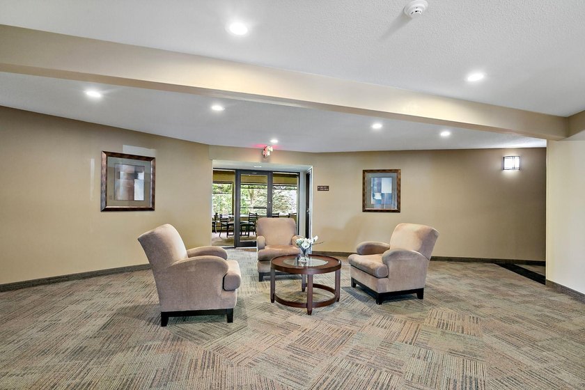 Welcome home to effortless, maintenance-free living in highly - photo 2