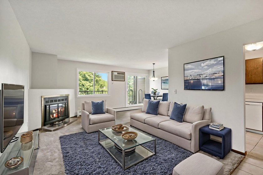 Welcome home to effortless, maintenance-free living in highly - photo 3