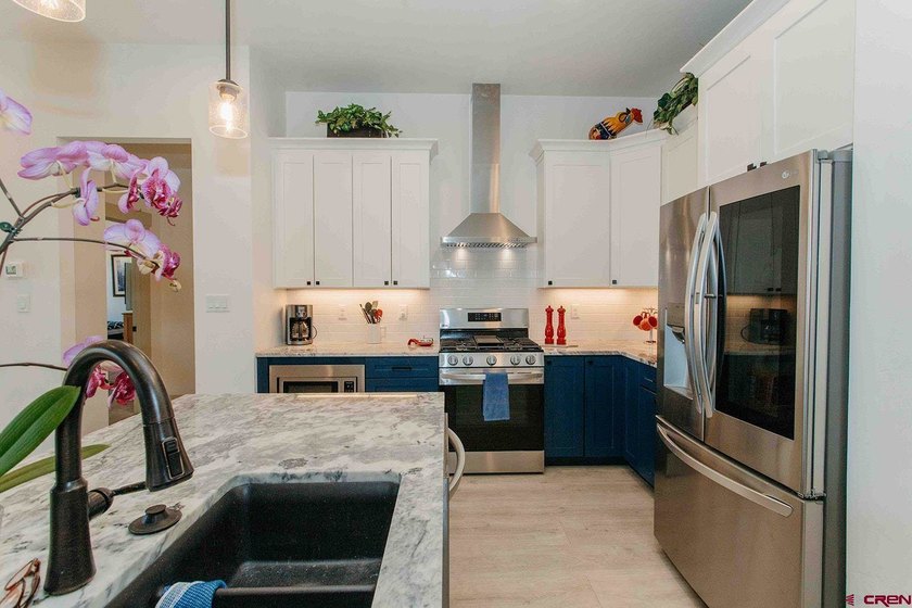 Custom-built home situated on a spacious corner lot with - photo 8