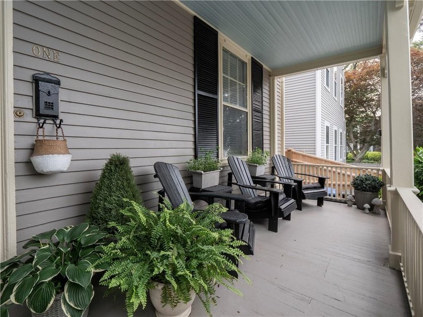 Tucked off Kay St, this side by side two family home is a - photo 3