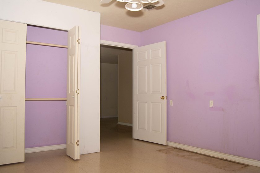 This 3/2/2 home offers incredible potential and plenty of space - photo 14
