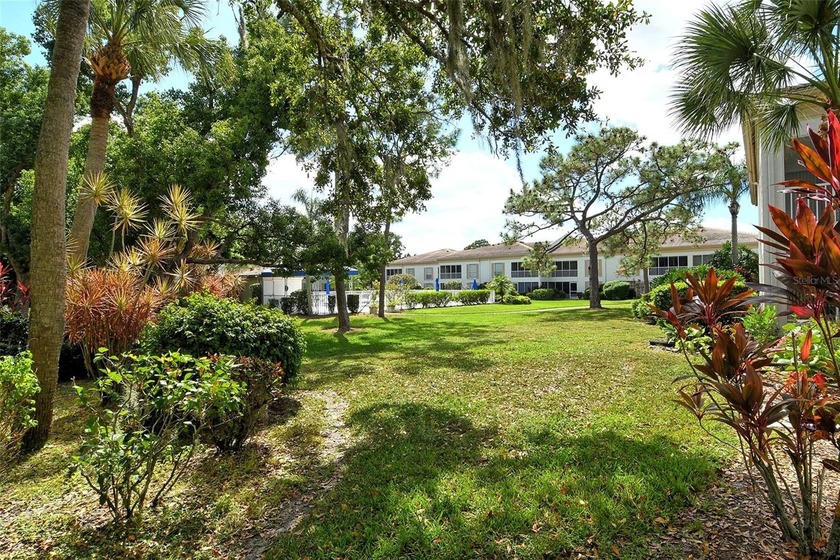 Welcome to this beautiful 2-bed, 2-bath first-story end unit in - photo 45