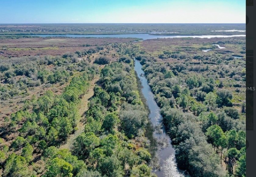 0.38 Acre lot located on Scott Canal which leads to Peace River - photo 3