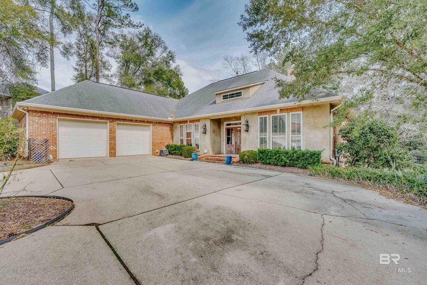 Located in the Rock Creek Golf Course community, this 4-bedroom - photo 2