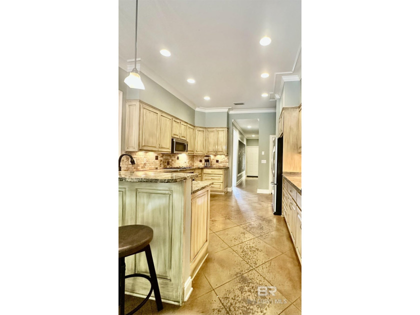 Located in the Rock Creek Golf Course community, this 4-bedroom - photo 4