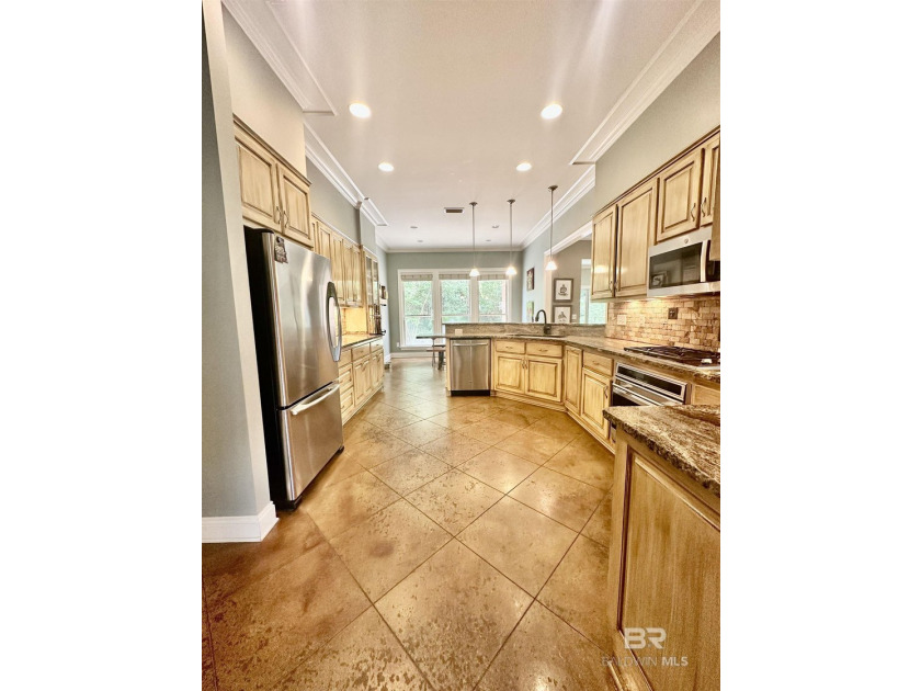 Located in the Rock Creek Golf Course community, this 4-bedroom - photo 5
