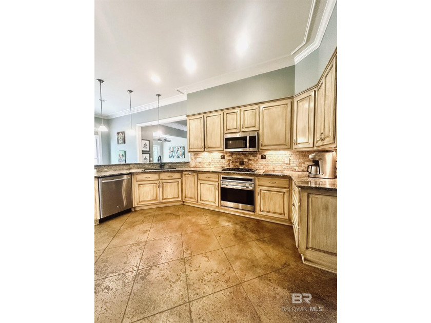 Located in the Rock Creek Golf Course community, this 4-bedroom - photo 6