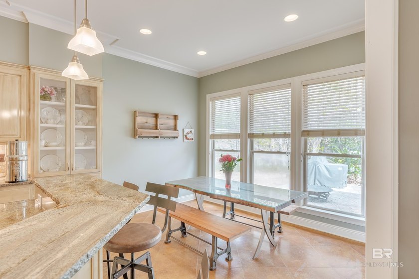 Located in the Rock Creek Golf Course community, this 4-bedroom - photo 7