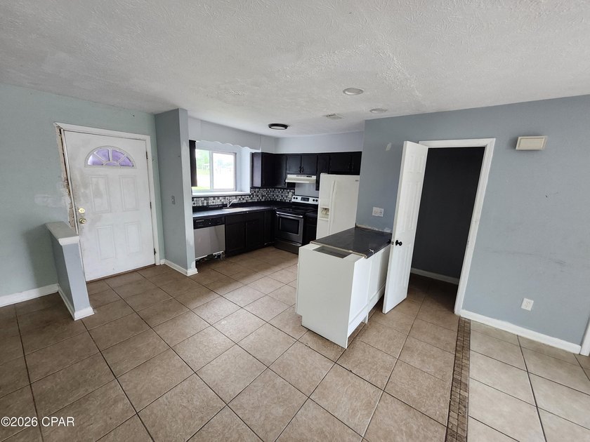 This home offers solid potential and good bones. Townhome - photo 11