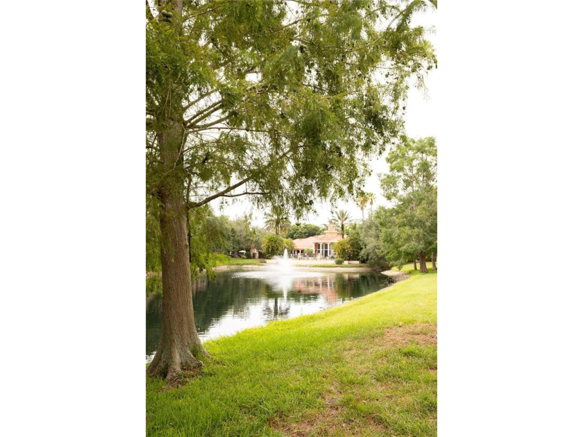 Welcome to this charming first-floor end-unit condominium - photo 14