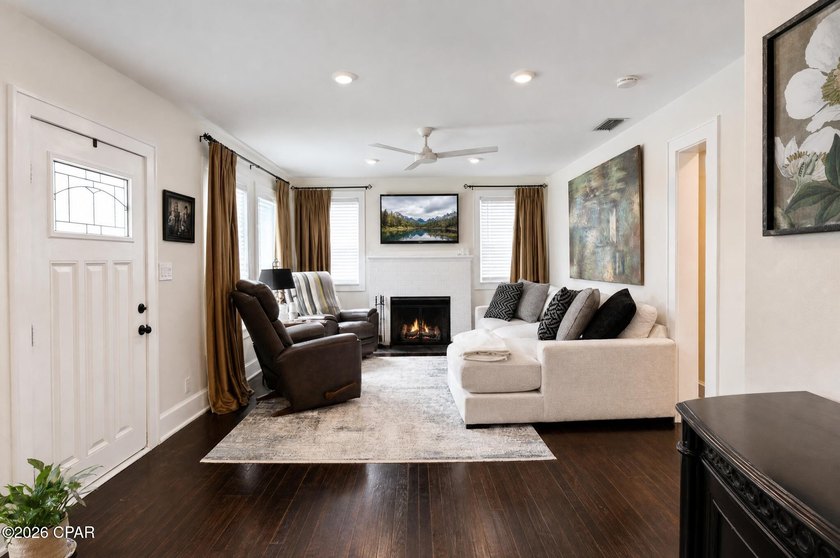 Welcome to this charming 3-bedroom, 2-bathroom home on one of - photo 2