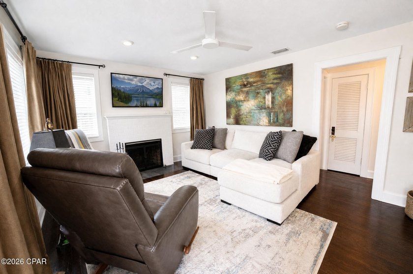 Welcome to this charming 3-bedroom, 2-bathroom home on one of - photo 3