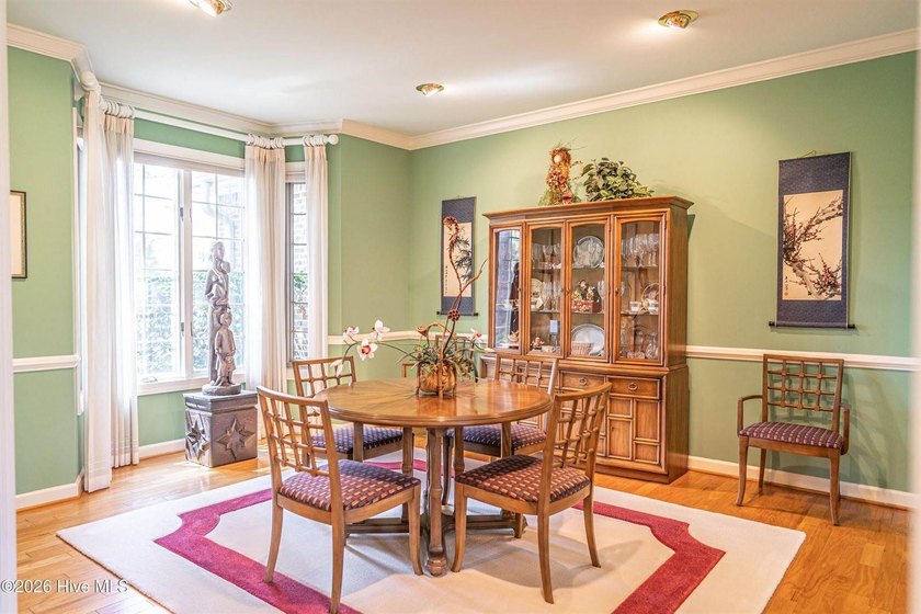Located in the Pinehurst No. 6 neighborhood, this custom-built - photo 3