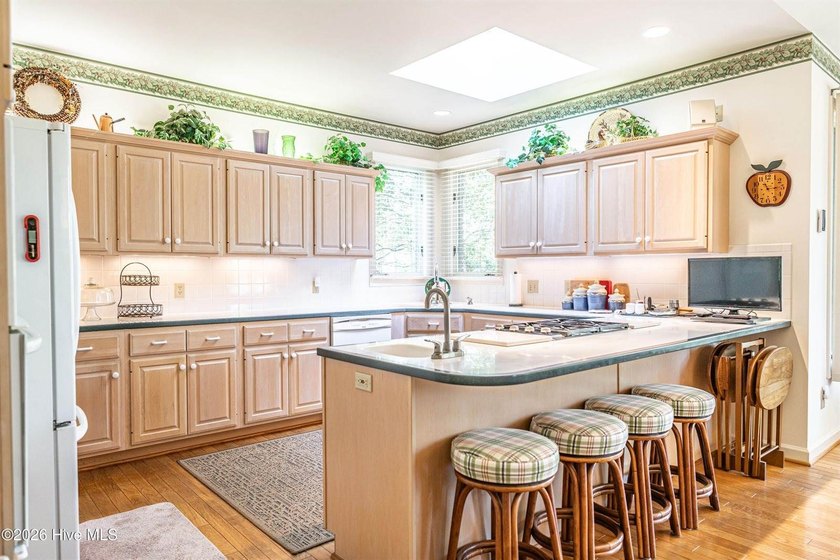 Located in the Pinehurst No. 6 neighborhood, this custom-built - photo 5