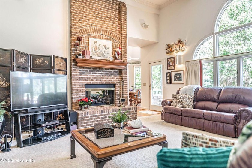 Located in the Pinehurst No. 6 neighborhood, this custom-built - photo 8