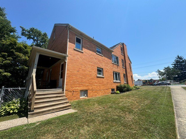 Beautiful brick two unit near the VA that has a two-car detached - photo 5