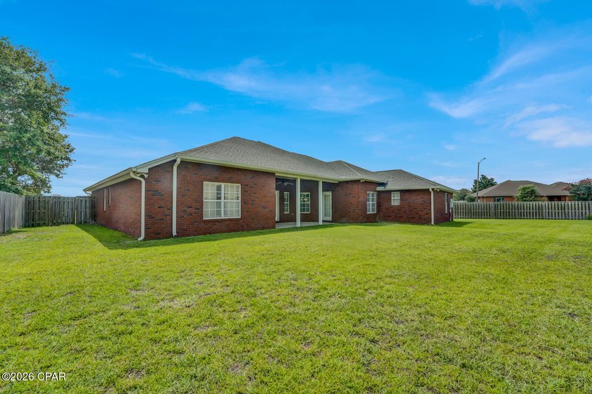 This CUSTOM all brick one level 4 bedroom 3.5 bath home with - photo 4
