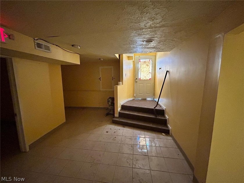 Versatile Retail / Service Building with Income - Prime E. 185th - photo 3