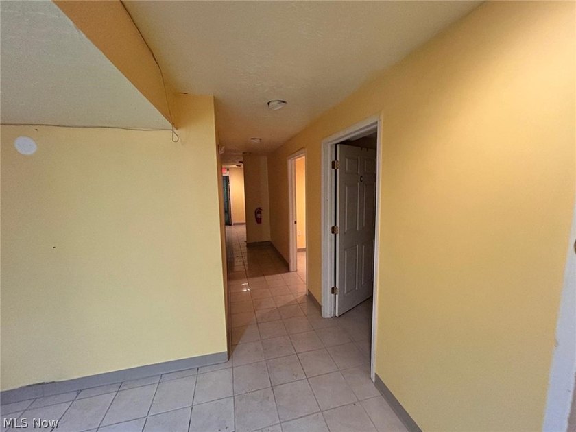Versatile Retail / Service Building with Income - Prime E. 185th - photo 8