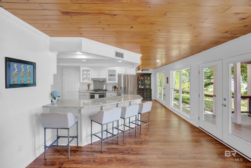This exquisite bayfront residence features 1.22 acres along the - photo 12