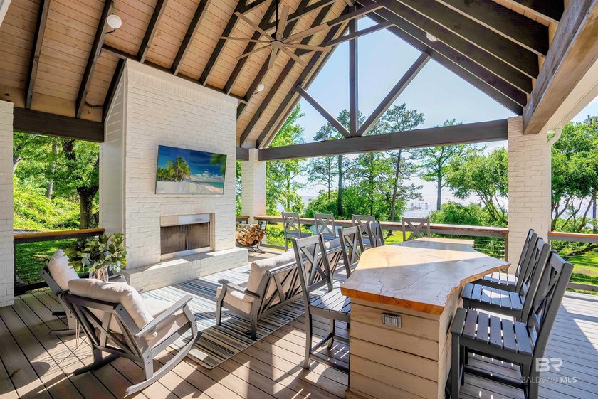 This exquisite bayfront residence features 1.22 acres along the - photo 13