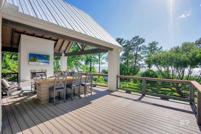 This exquisite bayfront residence features 1.22 acres along the - photo 14