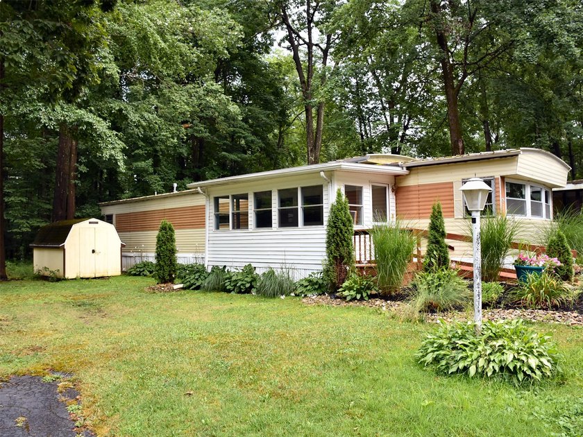 Welcome home to this completely remodeled mobile home featuring - photo 4